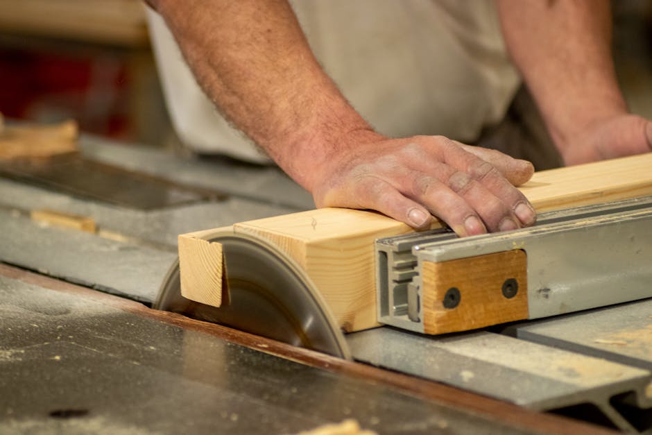 Master carpenter inspecting wood for custom cabinets